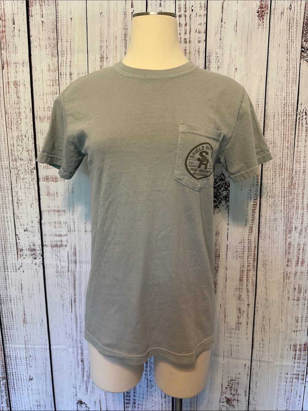 Comfort Colors Pocket Tee in Sage Green with Chest Emblem